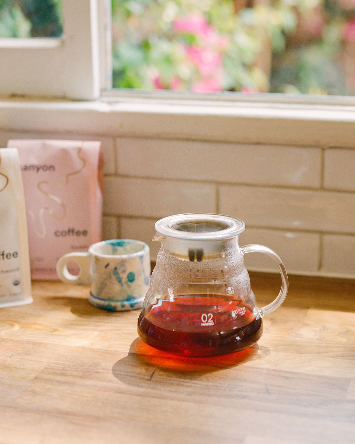 Glass range coffee server by Hario at home with a ceramic mug
