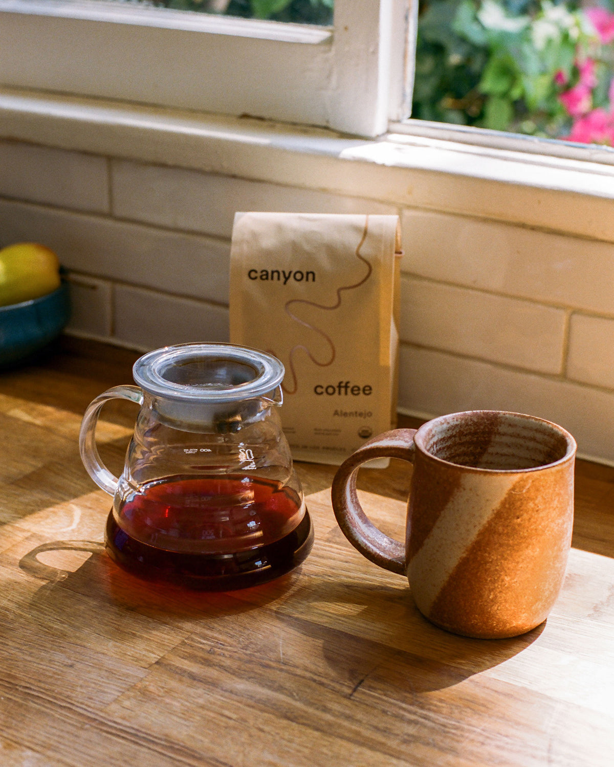 Glass range coffee server by Hario at home with a ceramic mug
