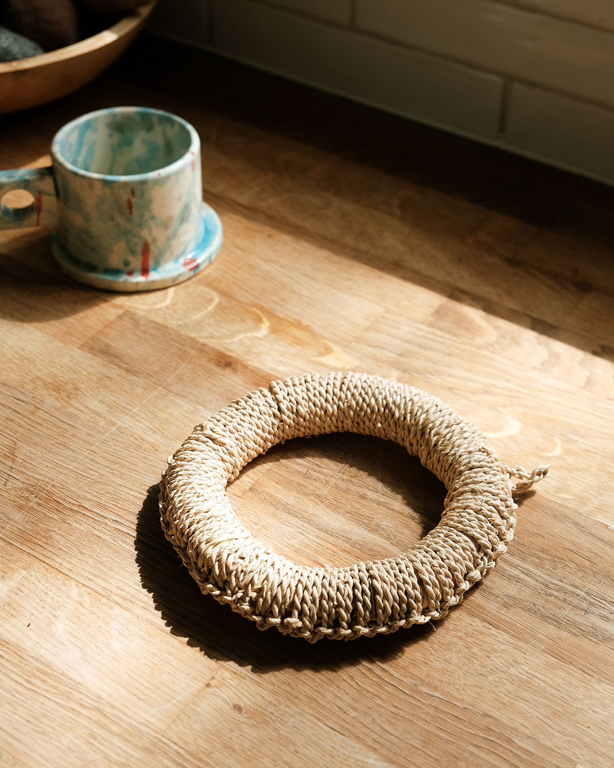 Kettle Holder made in Japan for Canyon Coffee on the kitchen counter with a Peter Shire mug